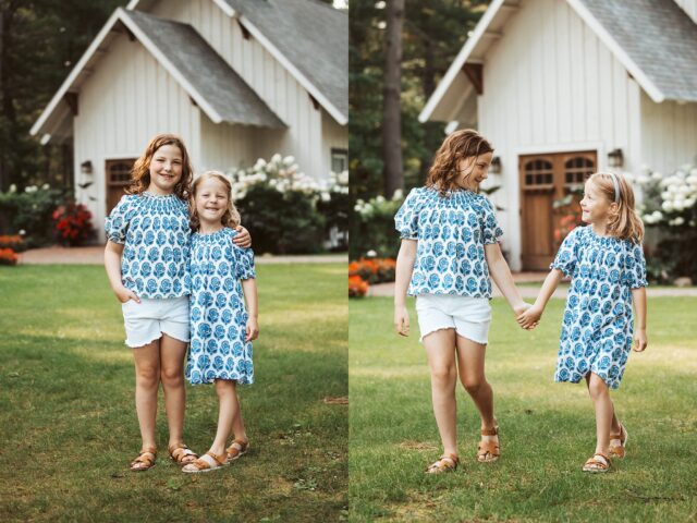 Two young sisters smiling for a casual photoshoot at Grand View Lodge in Nisswa, MN